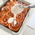 start drizzling the cinnamon rolls