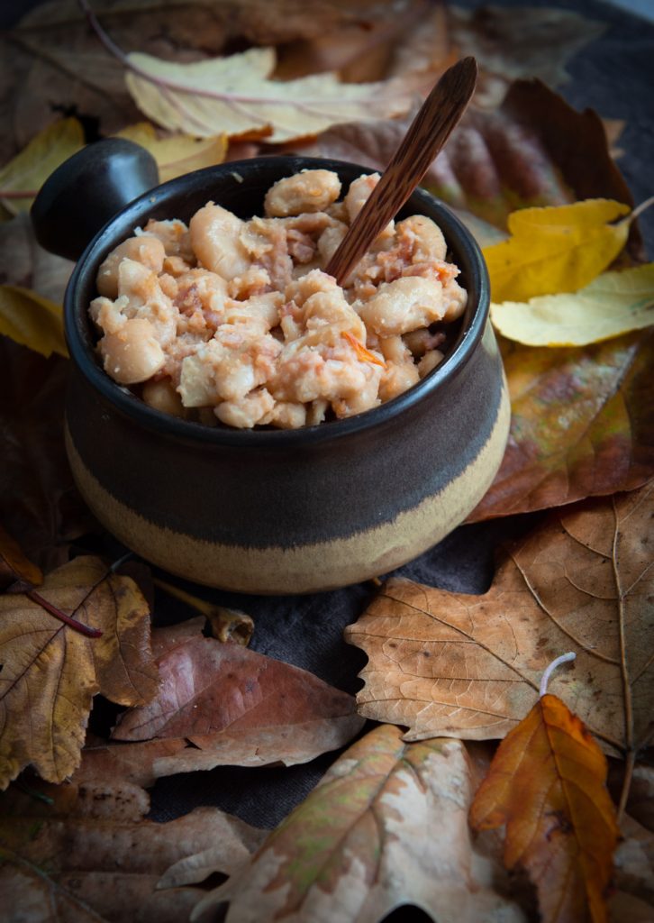 A spoon with Peruvian frijoles