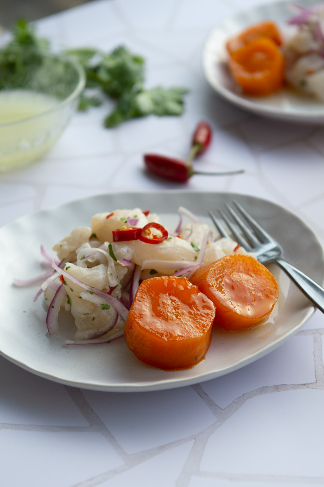 Ceviche serve with caramelised sweet potatoes