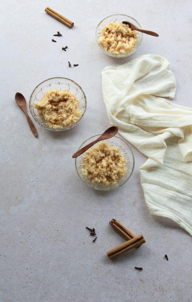 a composition with three bowls of Peruvian Rice Pudding. 