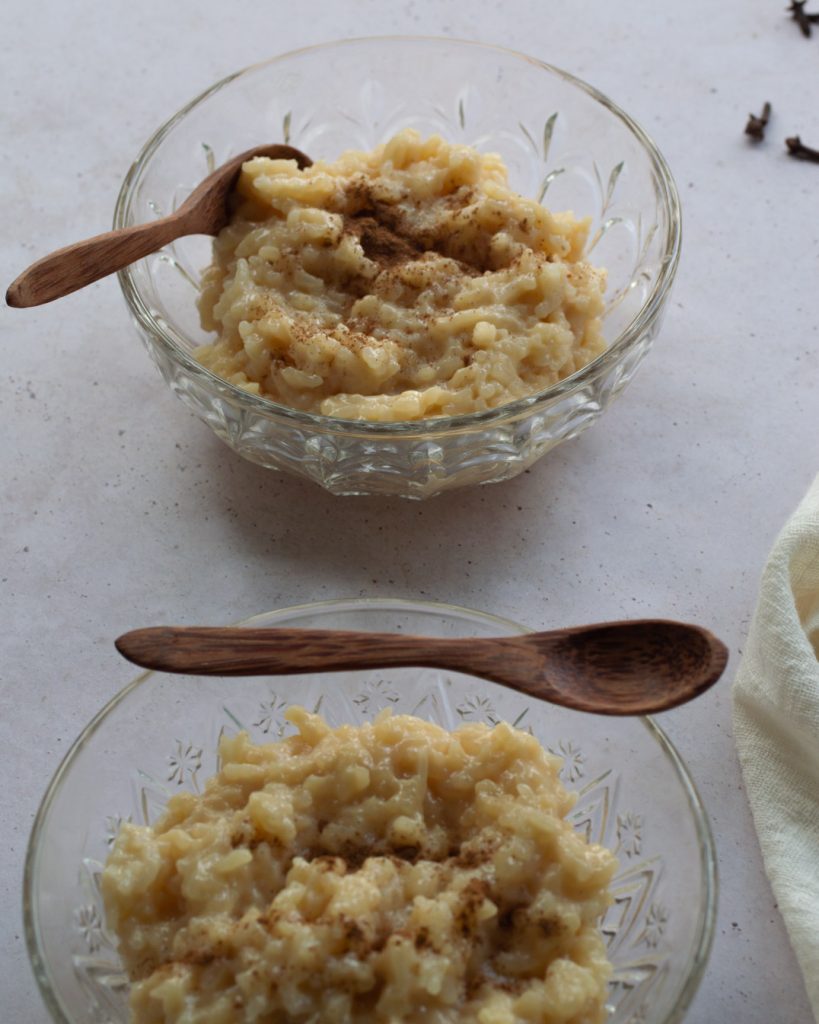 a close up of two bowls of Rice Pudding