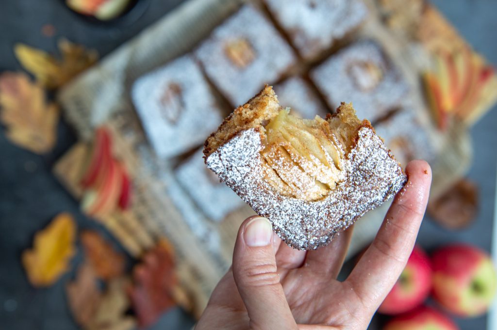 A bite of the coffee cake. Showing the layers you cut into the apple. 