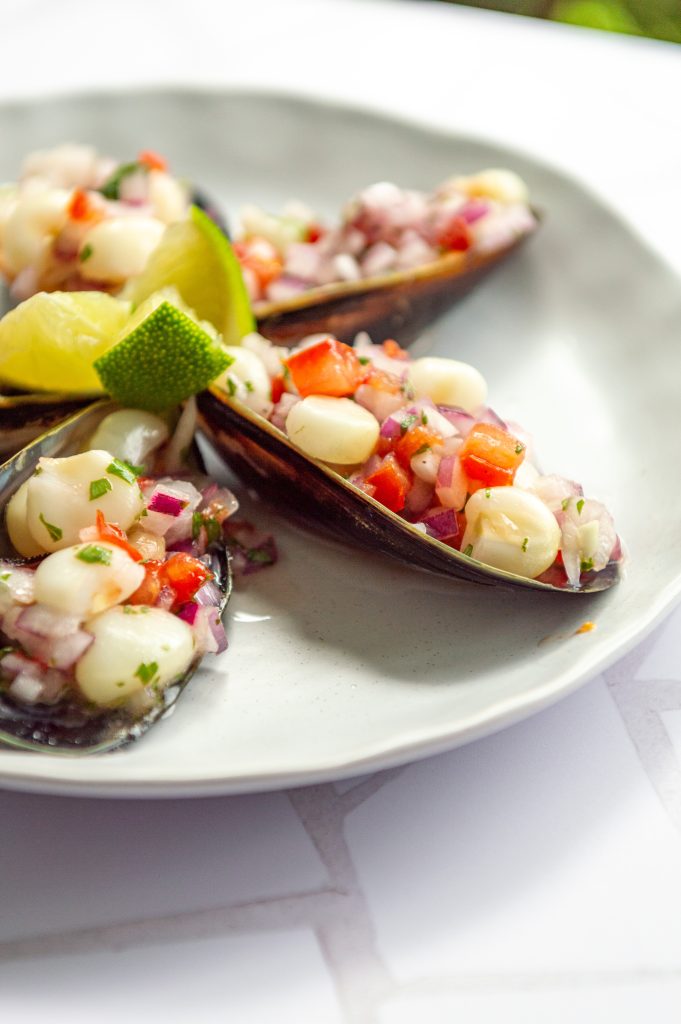 a dish with Peruvian mussels, choritos a la chalaca