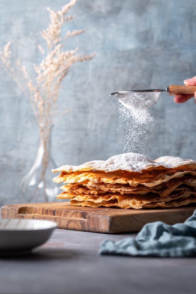 Sifting powdered sugar over Peruvian Volador